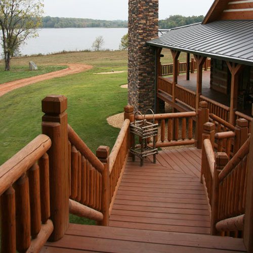 an intricate log staircase, outside