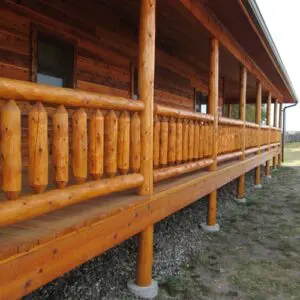 outdoor log railing on a cabin